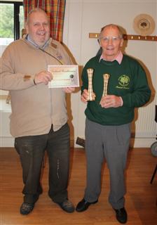 John Berkley presents Howard Overton with the certificate for turning of the month